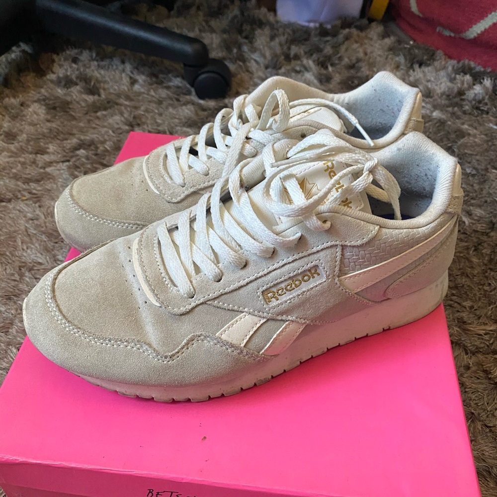 Cream colored Reebok’s